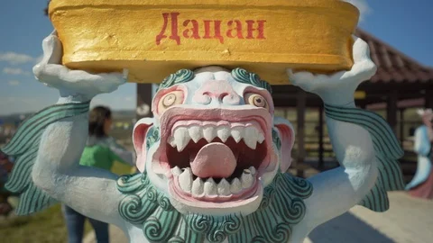 Close-Up: Creature Statue Holding Allah Sign  - Irkutsk, Russia Stock Footage 117890242