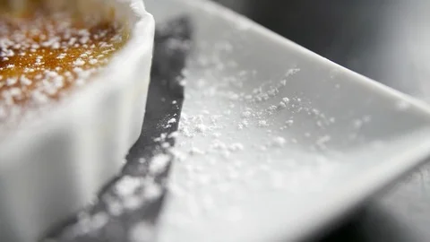 Close up of creme brulee panning left  Stock Footage 112575403