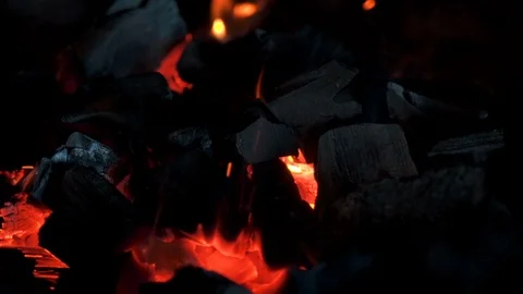 Close-up  crest of flame on burning wood in fireplace Stock Footage 102577010