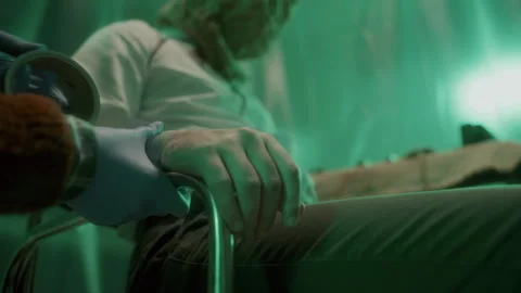 Close-Up of Criminal Using Duct Tape to Bind Hands of Victim to Chair Video stock 301509387