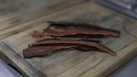 Close up of Crispy Bacon Slices Stock Footage 128462674
