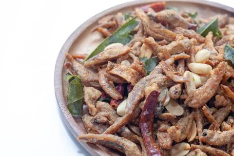 Close up of Crispy deep fried small fish on plate Stock Photos
