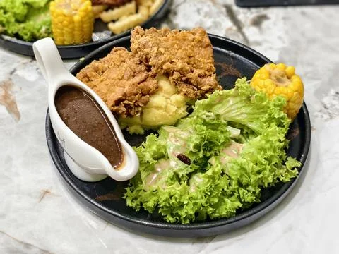Close-up of a crispy fried chicken cutlet Stock Photos