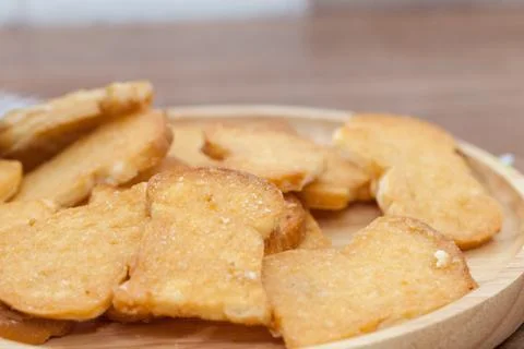 Close up of Crispy Garlic Bread on wooden plate Stock Photos