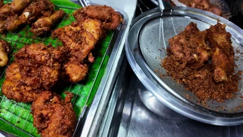 Close Up Crispy Thai Fried Chicken on Tray Street Food Night Market Video stock 330928489