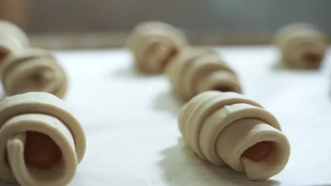 Close-up of croissants on a stand before baking Stock Footage 164401614