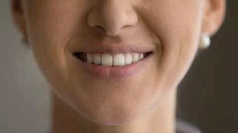 Close up cropped of beautiful woman healthy toothy beaming smile Stock Photos