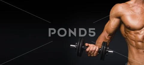 Close up cropped photo male with perfect abs doing gymnasium exercises. Stock Photos