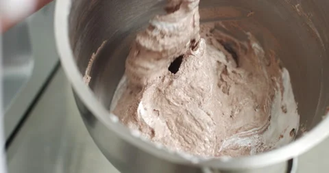 Close up cropped shot, making cream for cake or cookies macarons, mixing Stock Footage 150057983