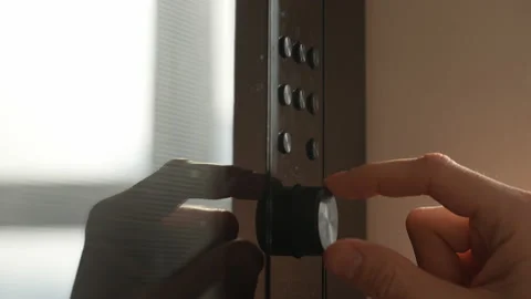 Close-up cropped shot of unrecognizable man touching button of modern panel of Video stock 236698214