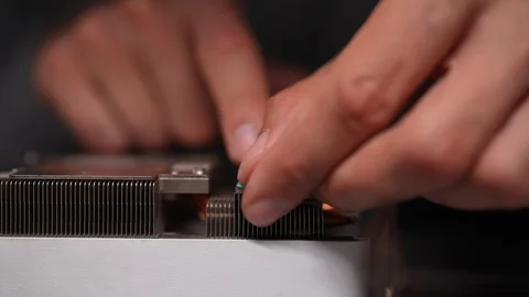 Close-up cropped shot of unrecognizable technician delicately positioning fresh Stock Footage 289574155