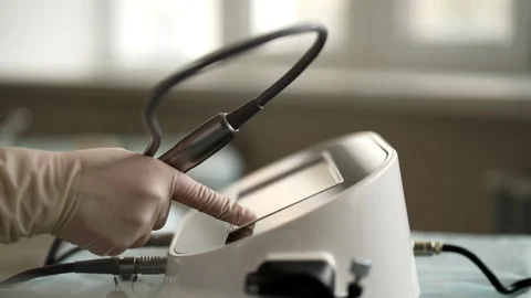 Close-up cropped shot of unrecognizable trichologist in gloves adjusting hair Stock Footage 277456727