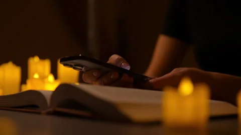 Close-up cropped shot of unrecognizable young woman in cozy setting using mobile Stock Footage 295637915