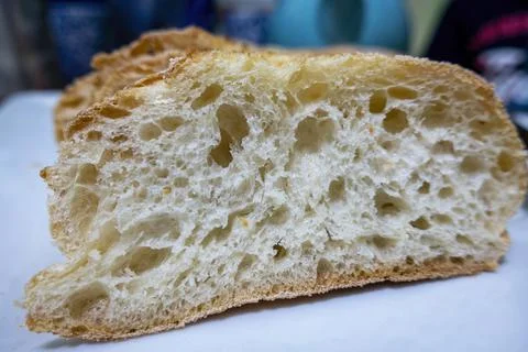Close-up of cross section pore structure of a slice of fresh homemade bread Stock Photos