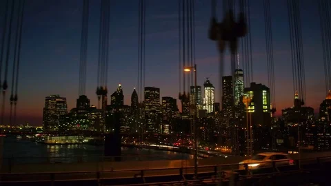CLOSE UP: Crossing Manhattan bridge overlooking Brooklyn bridge and NYC downtown Stock Footage 74753648
