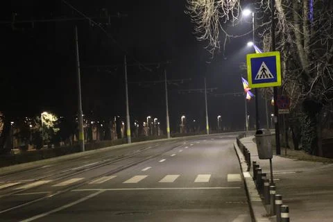 Close up of a crosswalk night time empty Stock Photos