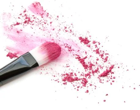 Close up of crushed blush on white background and cosmetic brush Stock Photos