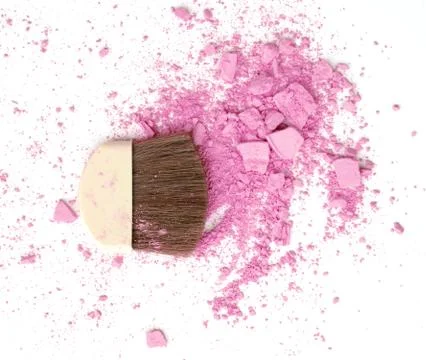 Close up of crushed blush on white background and cosmetic brush Stock Photos