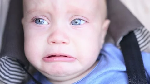 close-up crying baby infant big blue eye... | Stock Video | Pond5