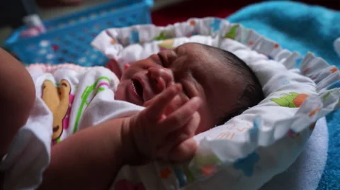 Close up of crying newborn baby that need a diaper change Stock Footage 45806261