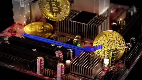 Close-up of cryptocurrency coins on a computer motherboard Stock Footage 328286440