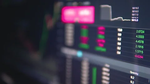 Close-up of cryptocurrency trading interface with fluctuating values Stock Footage 328286505