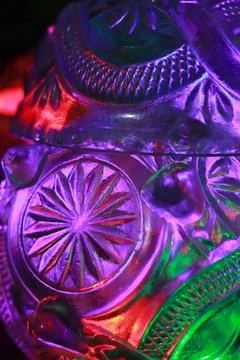 Close-up of a crystal mask. Colorful abstract background. Stock Photos