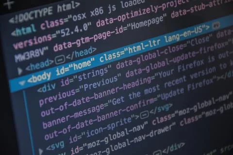 Close up css HTML code on monitor screen with black background Stock Photos