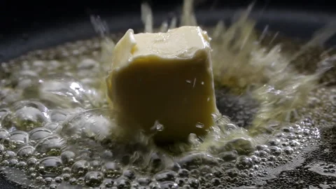 Close-up of cube meter in nonstick frying pan. Stock Footage 132507191