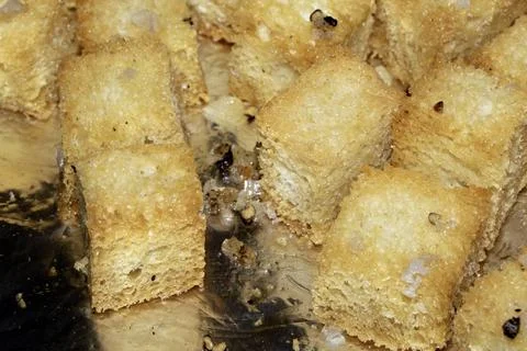 Close up of cubed fried bread croutons freshly made for soup Stock-Fotos