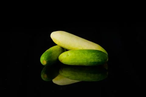 Close up Cucumber on black Stock Photos