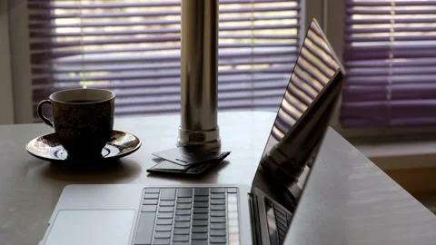 Close-up of a cup of black coffee, laptop, bank or credit card on the bar i.. Stock Footage 236705052