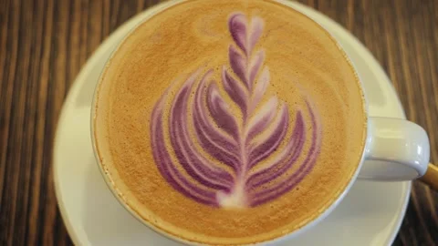Close up of cup of coffee with latte art. Creatively coffee drinks and beverages Stock Footage 328160195