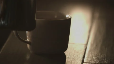 Close up of cup of coffee on tablet, waiter serving coffee in a cup Stock Footage 135700934