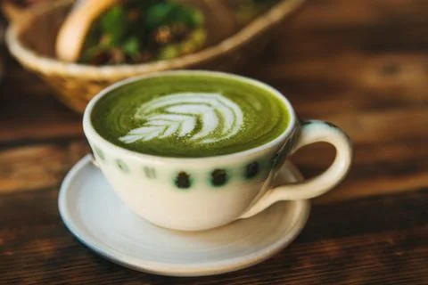Close-up. A cup of green tea called Matcha tea or green coffee with a pattern 写真素材