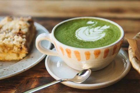 Close-up. A cup of green tea called Matcha tea or green coffee with a pattern 写真素材