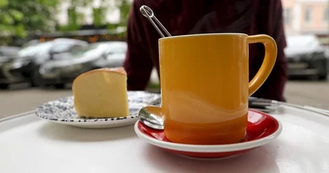 Close-up cup of tea in open air cafe Stock Footage 109529626