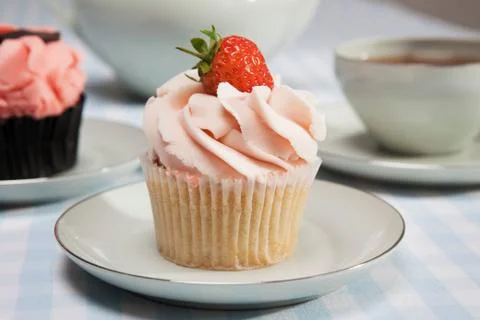 Close up of cupcake with strawberry Stock Photos