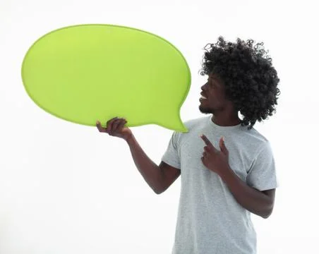 Close up. curly-haired guy with a speech bubble. Stock Photos