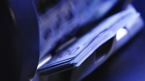 Close up of currency counting machine counting dollar banknotes. Bank automatic Stock Footage 231053413