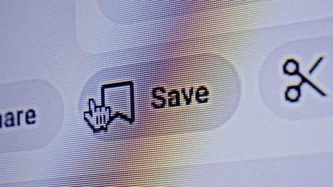 Close-up of a cursor clicking the Save button on a digital interface. Concept Stock Footage 336681804