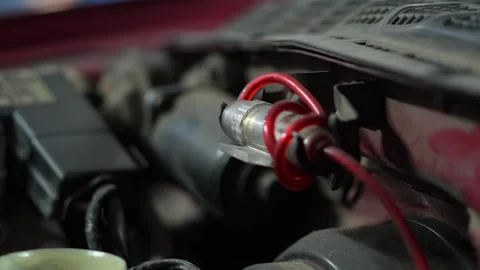 Close-up of a custom car audio fuse holder under hood. Stock-Footage 345708682