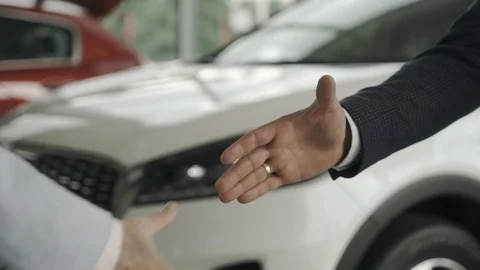 Close up of customer and sales assistant handshake. Stock Footage 91583682