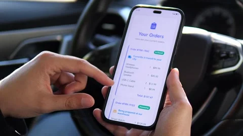 Close-up of a customer checking the precise location and estimated delivery time Stock Footage 315561123