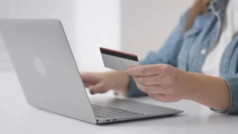 A close-up customer, looking at goods on the electronic display laptop Stock Footage 263153069