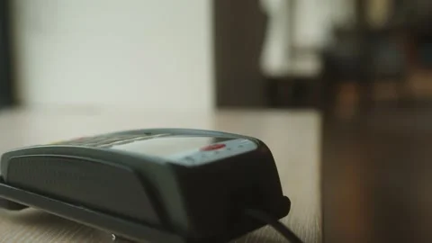 Close up customer paying using credit card contactless payment spending money in Stock Footage 194019296