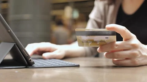 Close up customer paying using credit card contactless payment Relax discount Stock Footage 265927575
