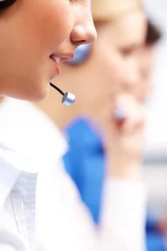 Close-up of customer support representative speaking into mic during work 스톡 사진