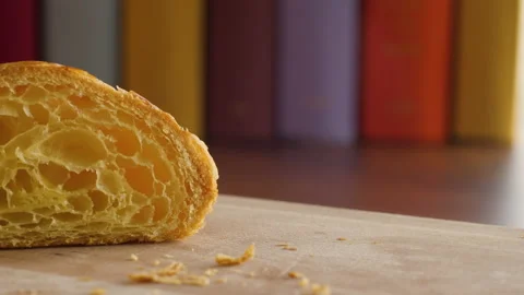 Close-up of the cut half of a fresh croissant 스톡 동영상 168173552