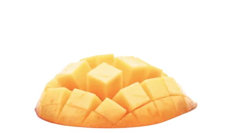 Close-up of cut mango slice on white background. Stock Footage 157813813